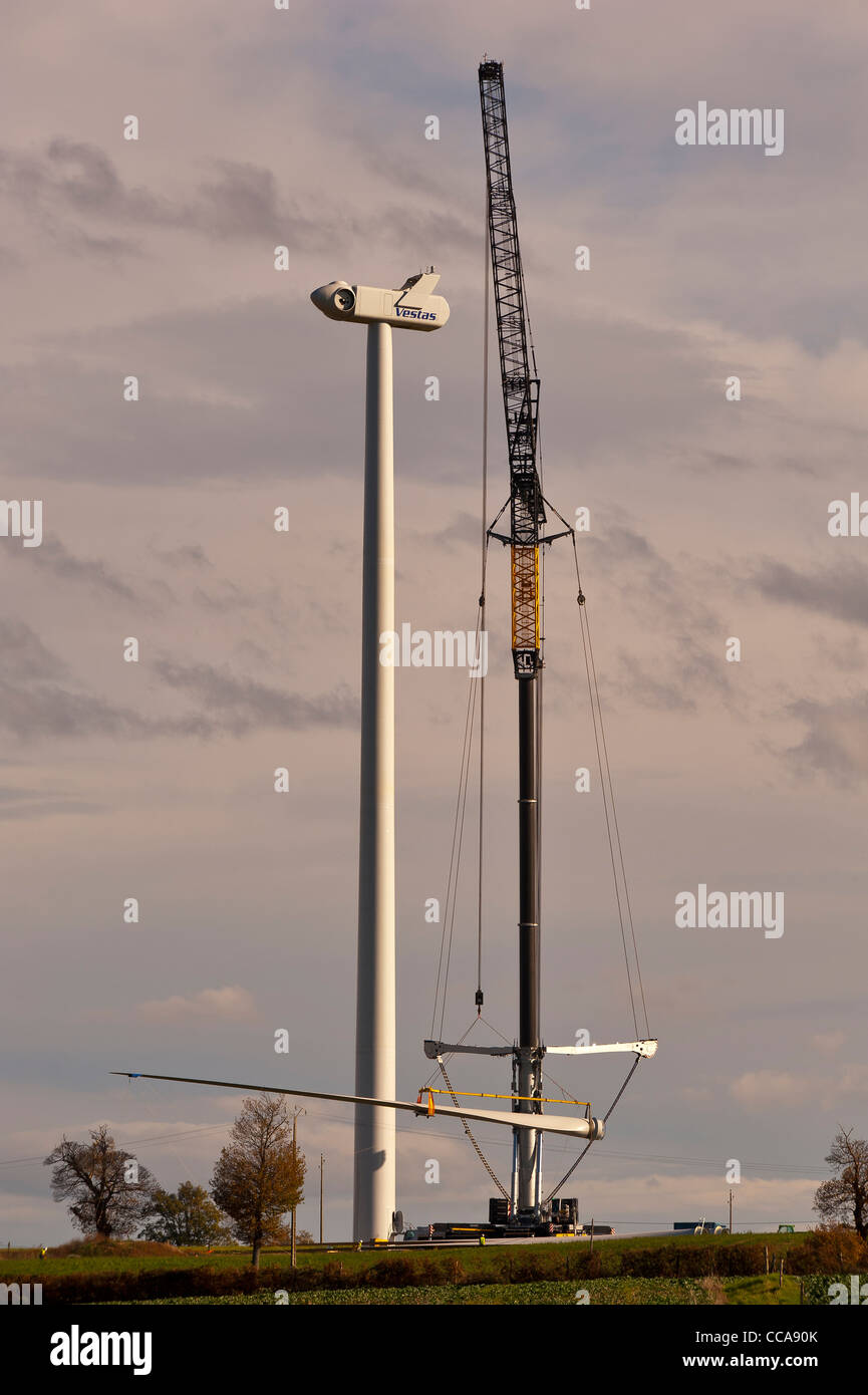A LIEBHERR LTM 112009.1 crane , mounting a Vestas wind turbine Stock