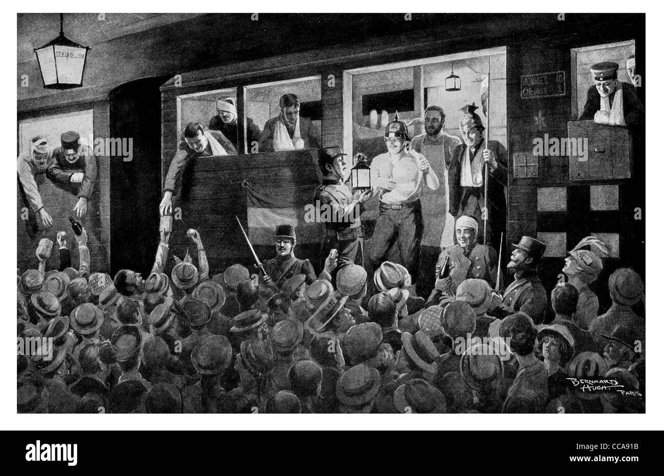 1914 wounded French soldiers return home Paris rest railway station German helmet uniform trophies trophy sick humour welcome Stock Photo