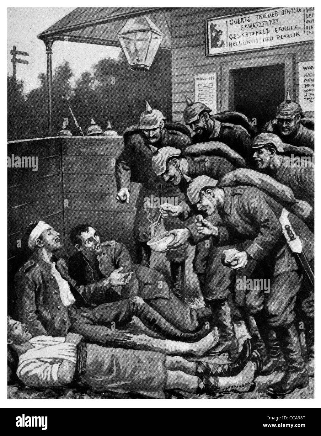 1914 Dying British Soldiers tortured Germans torture torment cruel teasing teased tease food hunger starvation starving prisoner Stock Photo