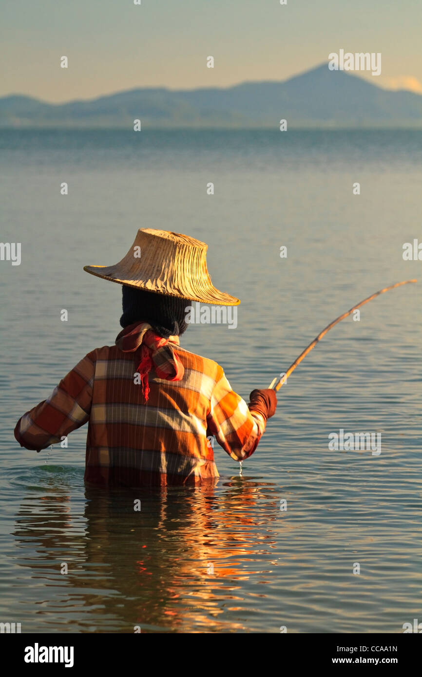 Fisherman wearing yellow hi-res stock photography and images - Alamy
