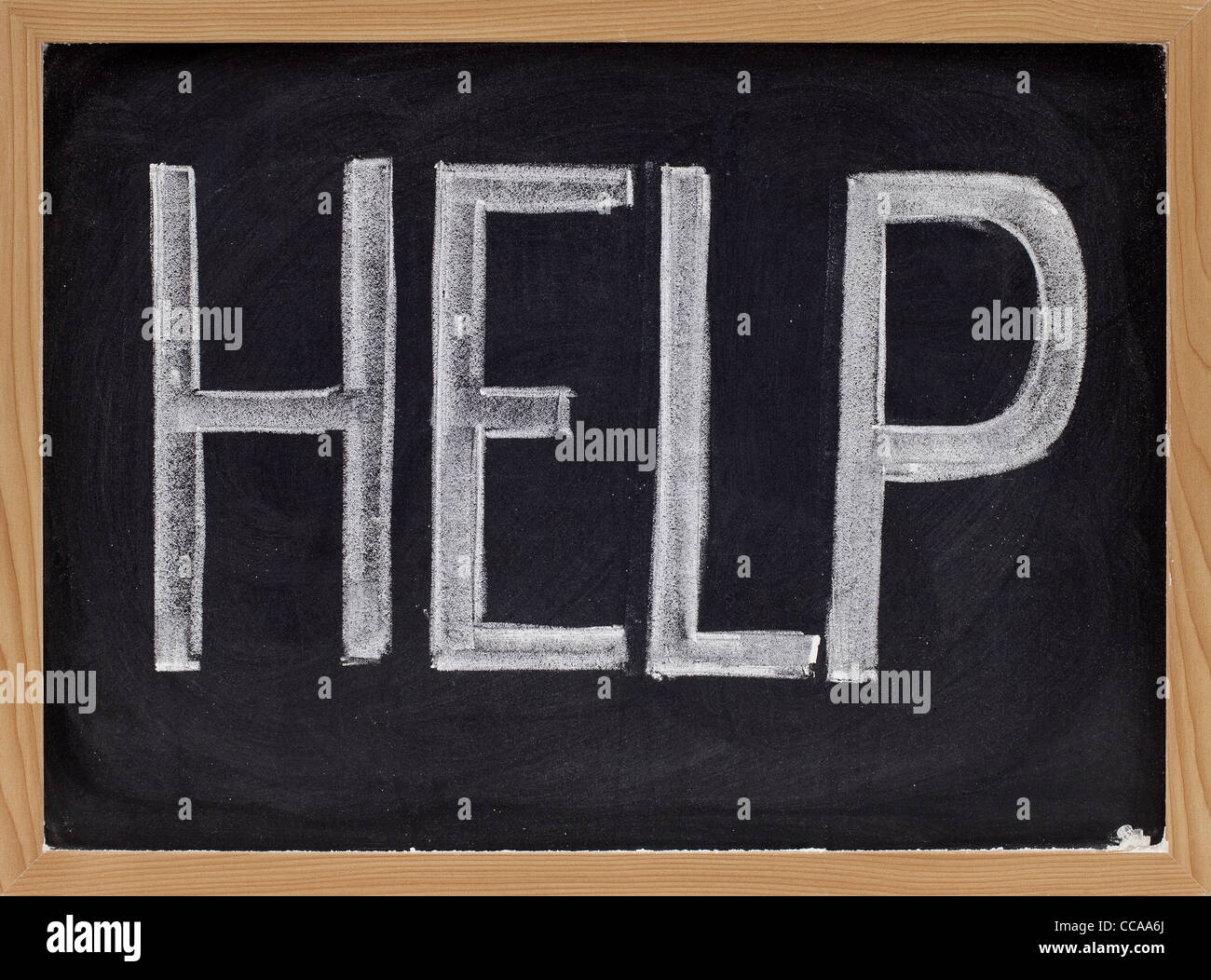 the word help - big letters in white chalk on blackboard Stock Photo ...