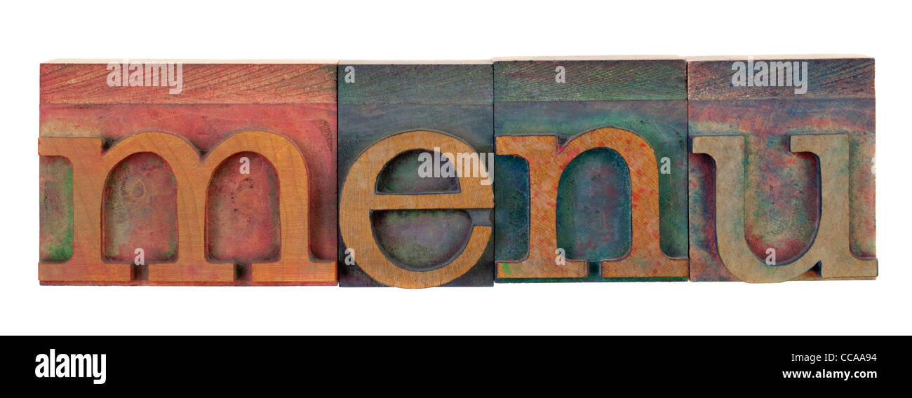 the word menu in vintage wooden letterpress type block, stained by ...
