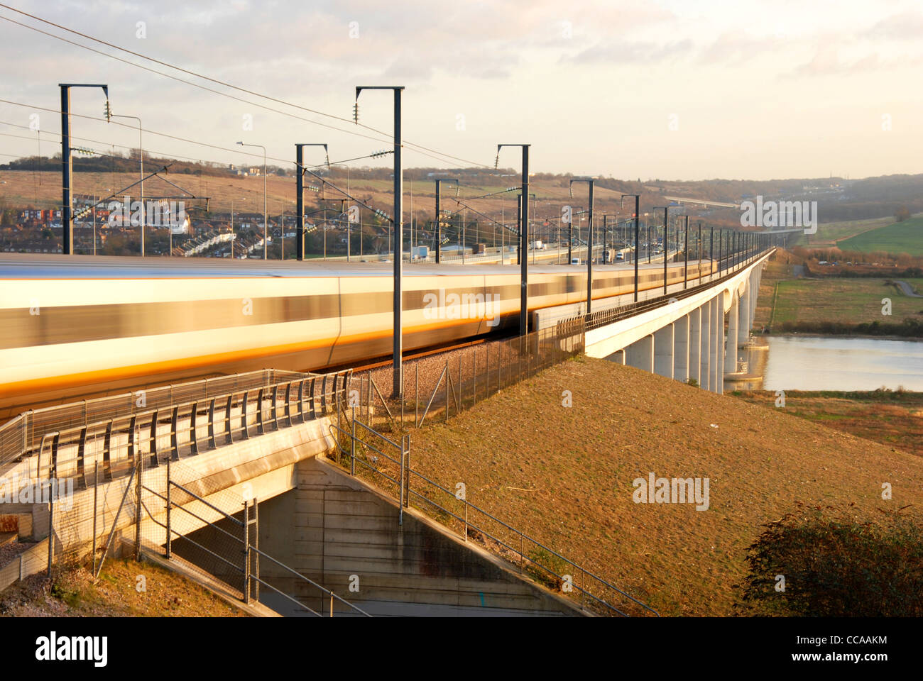 High speed train crossing bridge Stock Photo