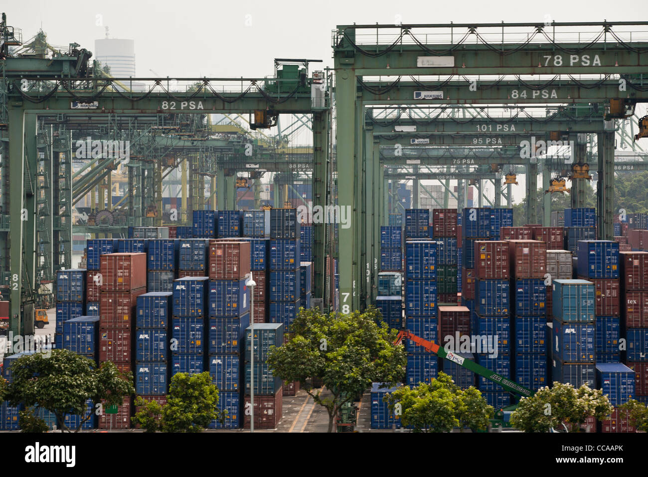 Containers are seen stacked at the Brani Terminal at the port of