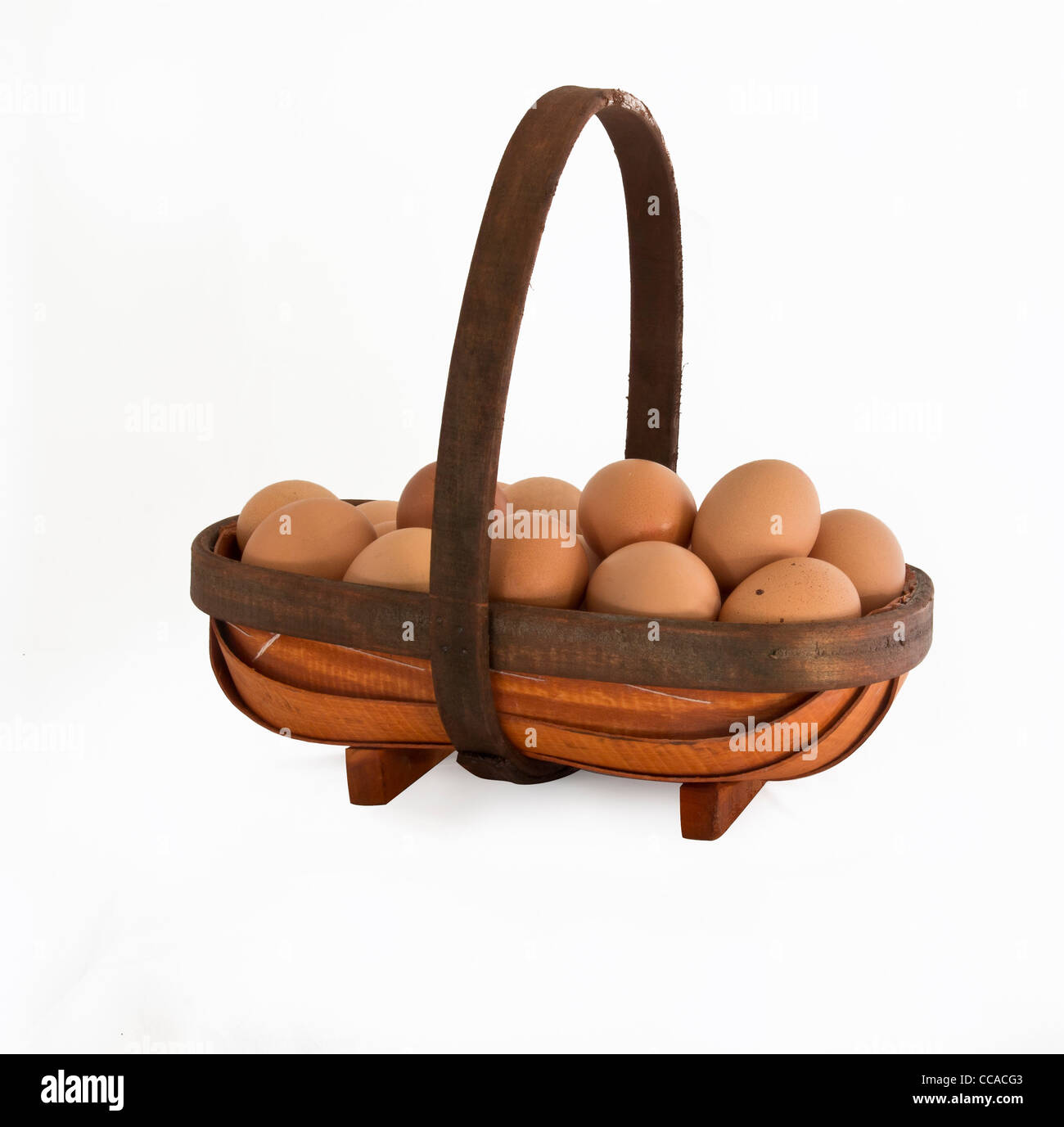 trug basket containing eggs Stock Photo