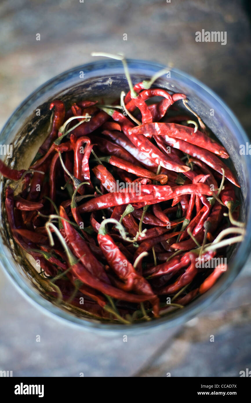 A pot of red chillies at Babu Shahi Bawarchi, New Delhi, India Stock Photo