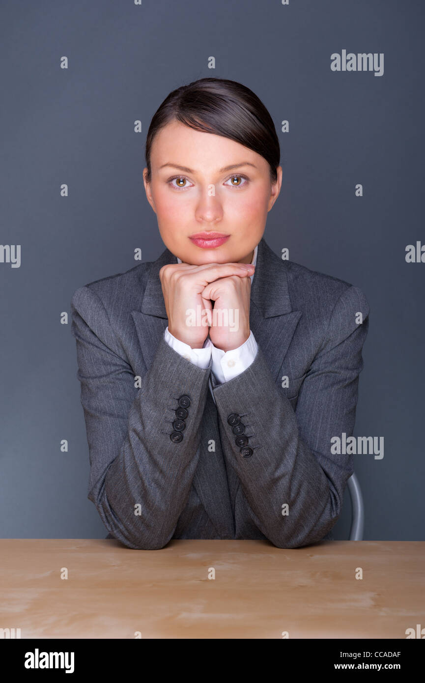 Smiling young business woman. In a modern office Stock Photo - Alamy