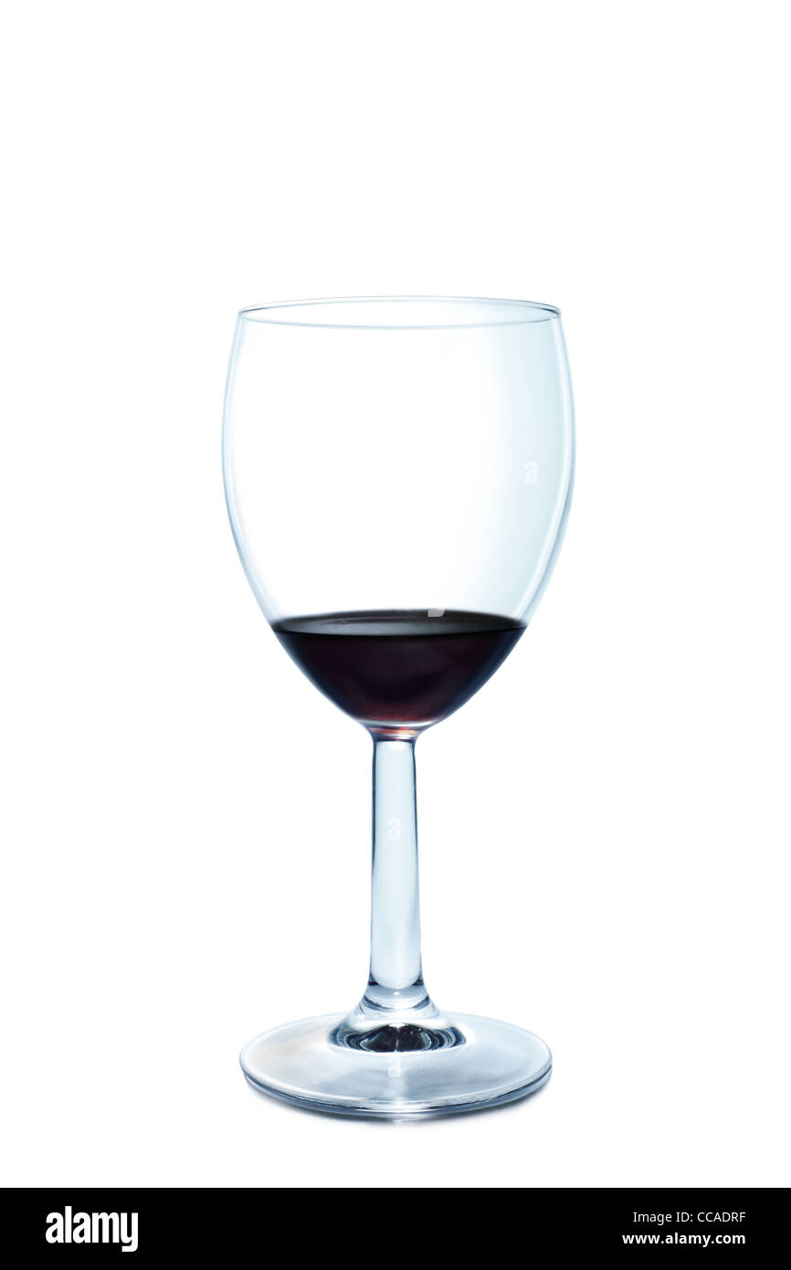 An Almost Empty Glass Of Red Wine Isolated On A White Background