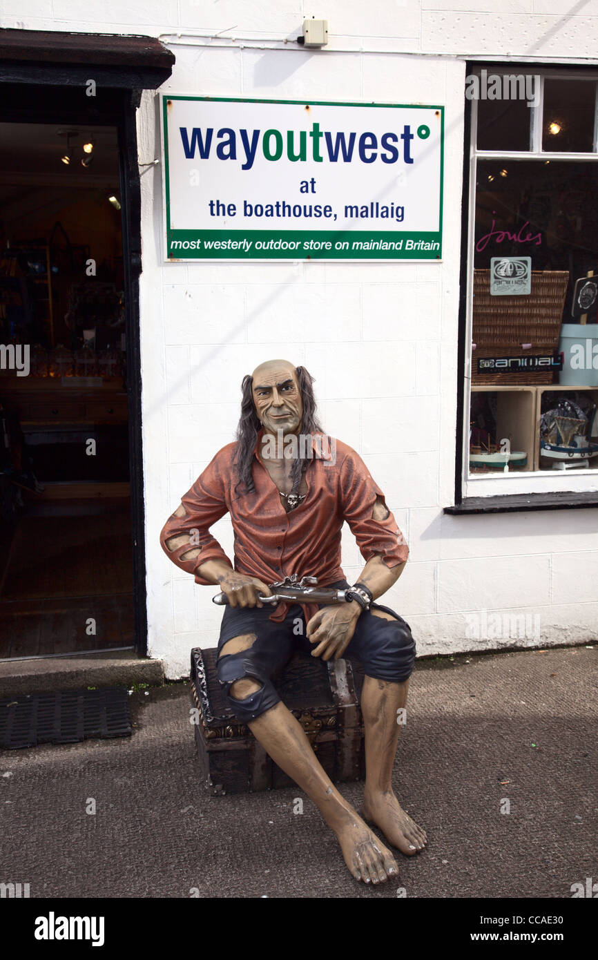 Dummy of man with pistol outside Wayoutwest shop Mallaig Scotland Stock Photo