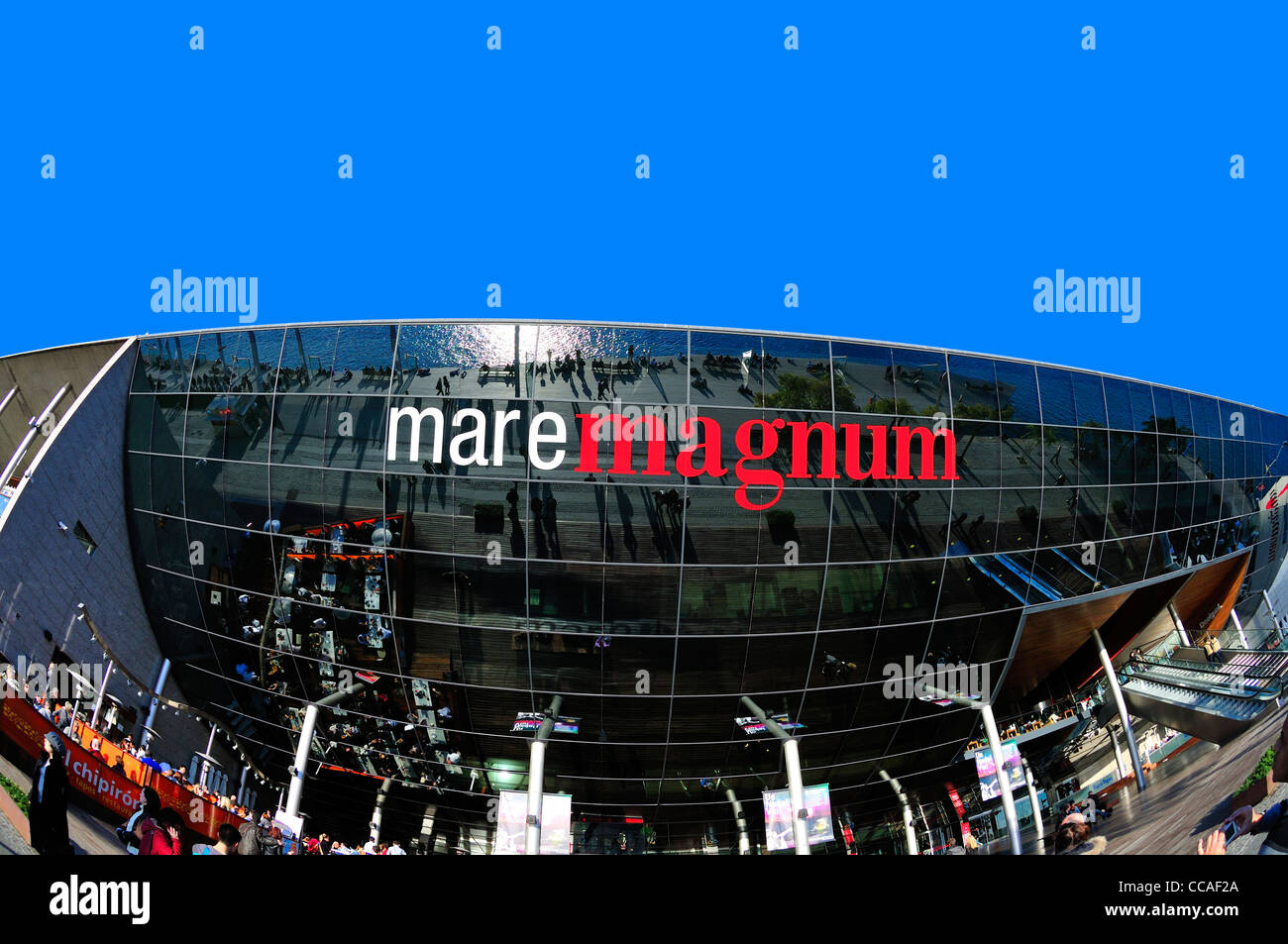 Barcelona, Spain. Maremagnum complex of restaurants and shops at far end of the Rambla del Mar. Stock Photo