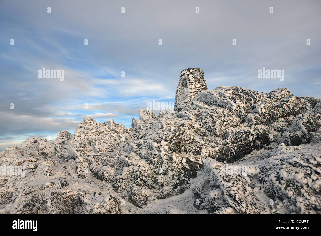 Summit cairn of Ben Lawers in winter Stock Photo