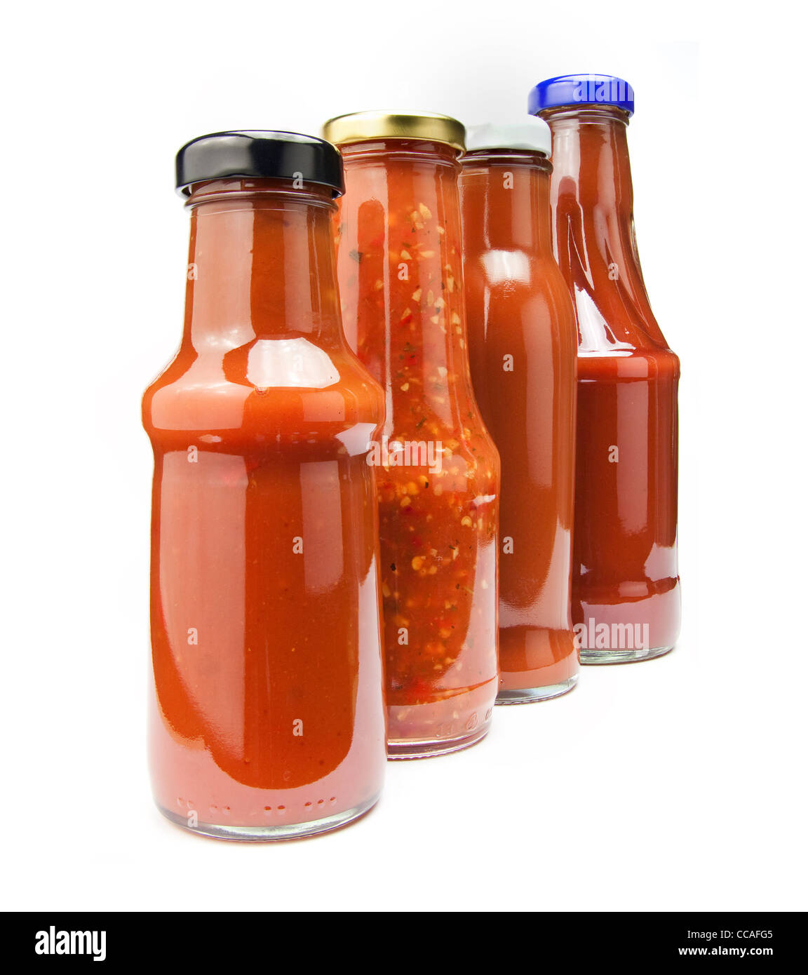 four ketchup bottles isolated on white Stock Photo Alamy