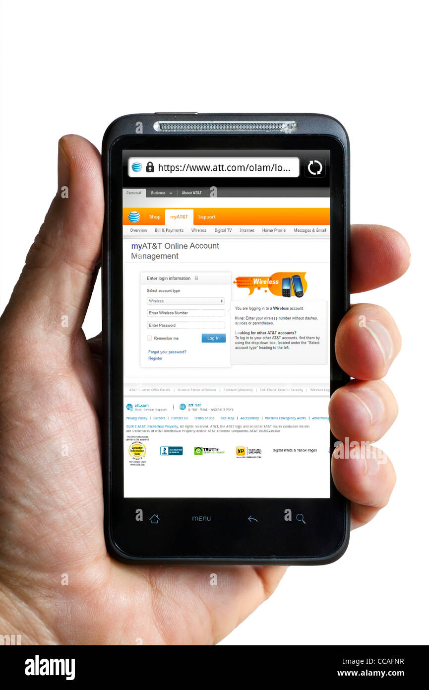 Managing an AT&T wireless account online via a smartphone Stock Photo