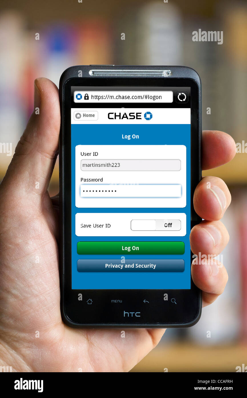 Logging on to online mobile banking with Chase Bank on an HTC smartphone Stock Photo