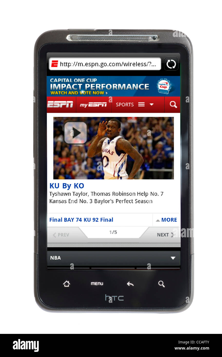Looking at the ESPN sports website on an HTC smartphone Stock Photo
