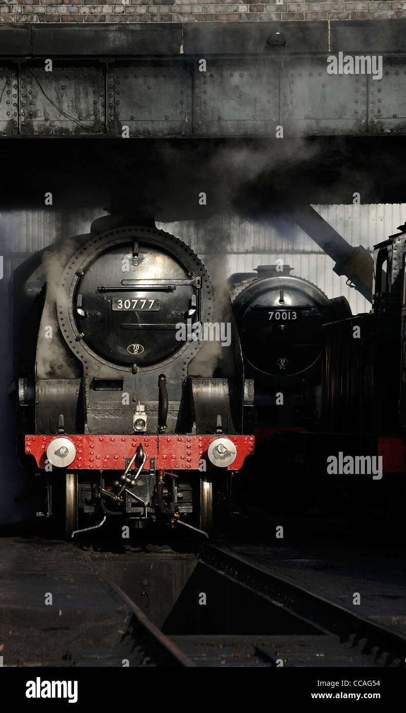 30777 sir lamiel in steam under a bridge with 70013 oliver cromwell in ...