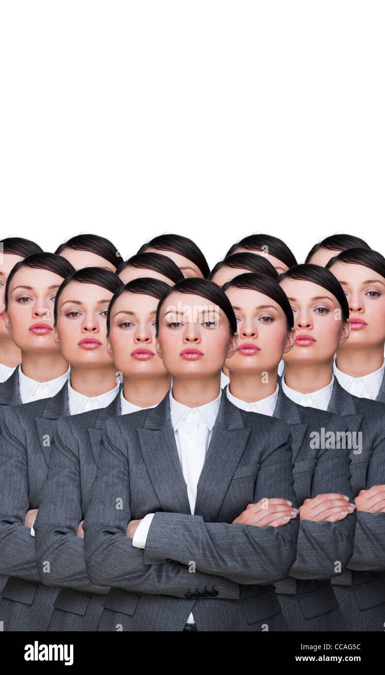Many identical businesswomen clones. Businesswoman production concept. Army of workers ready for your business Stock Photo