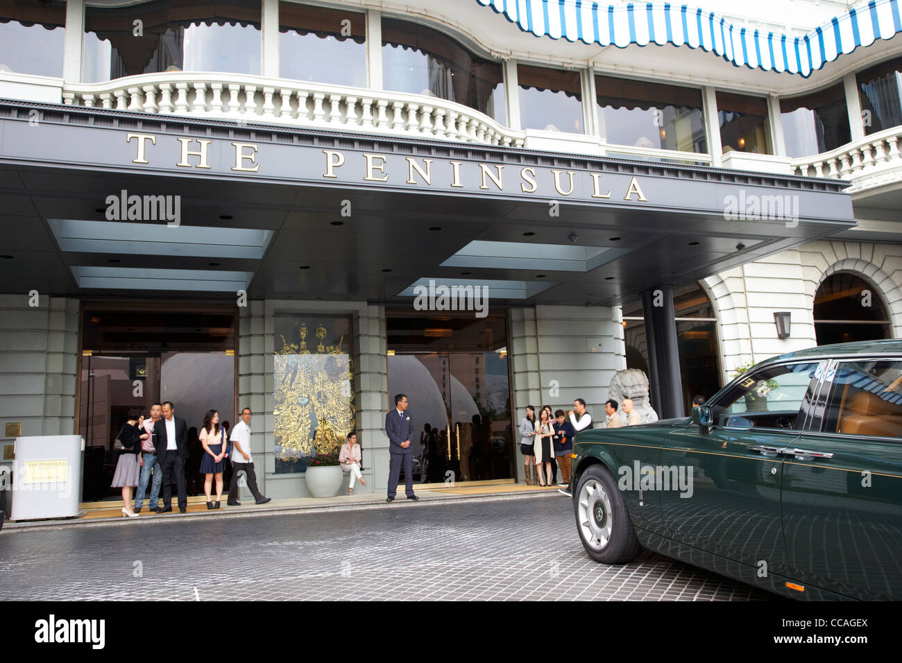 hotel green rolls royce outside the peninsula hotel hong kong hksar