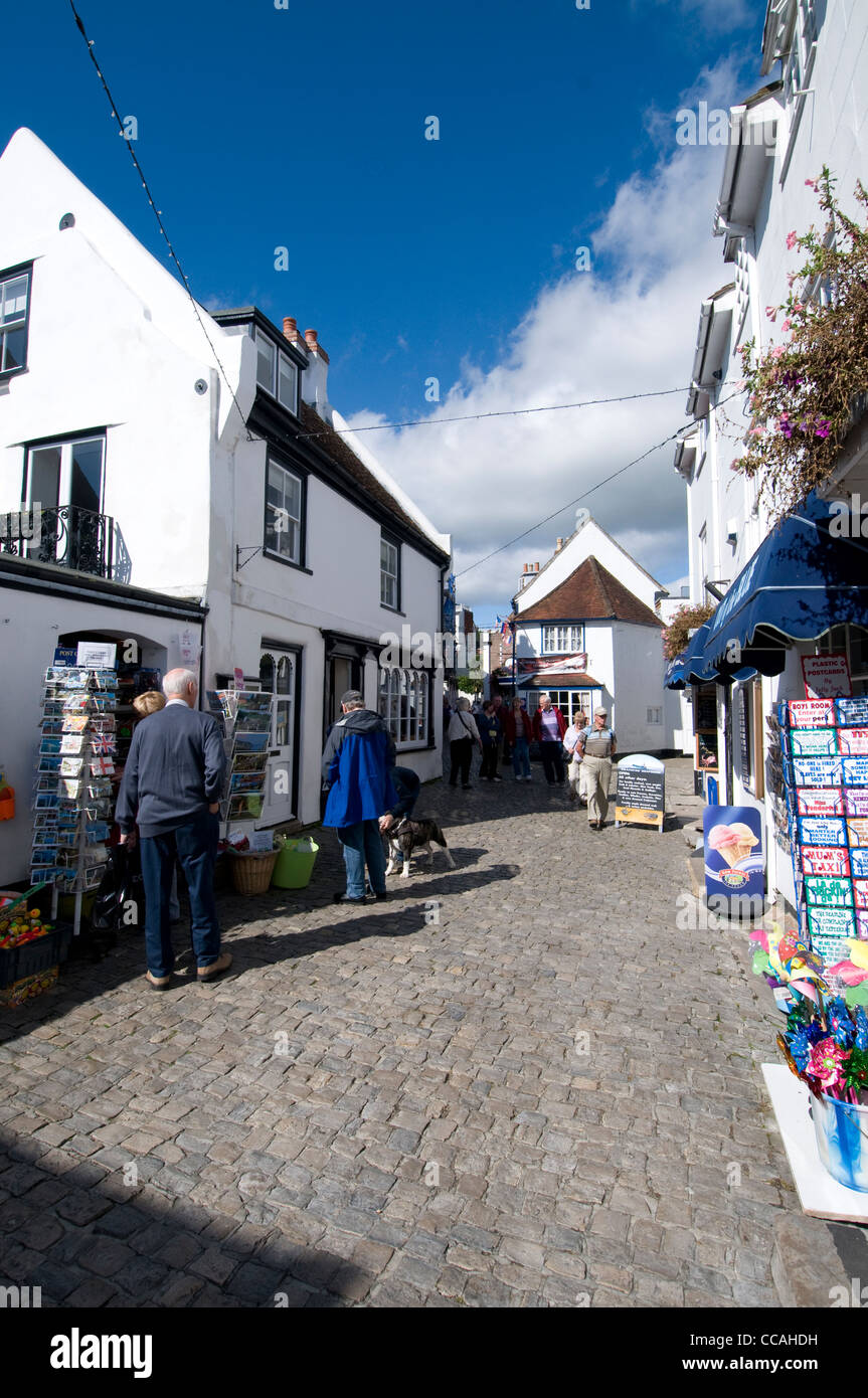 Tourists browsing at some of the shops in The Quay in Lymington on the boundary of the New Forest National Park, Britain. Stock Photo