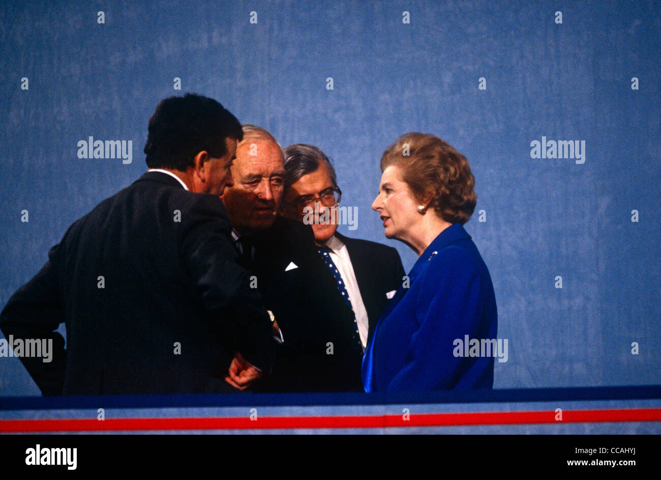 Ex British Prime Minister Margaret Thatcher speaks with ex colleagues on podium during John Major's 1991 Tory party conference. Stock Photo