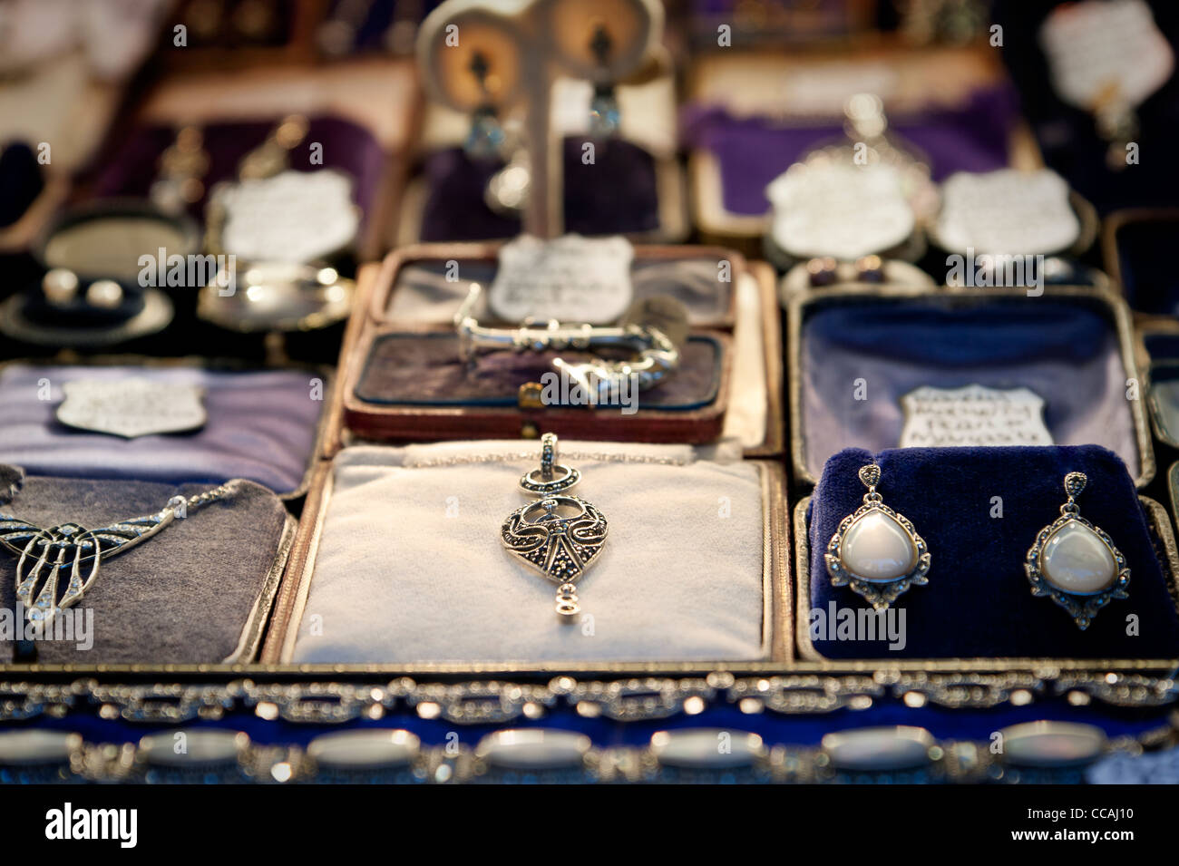 Beautiful secondhand jewellery in a shop window in Brighton lanes. East Sussex England UK Stock Photo