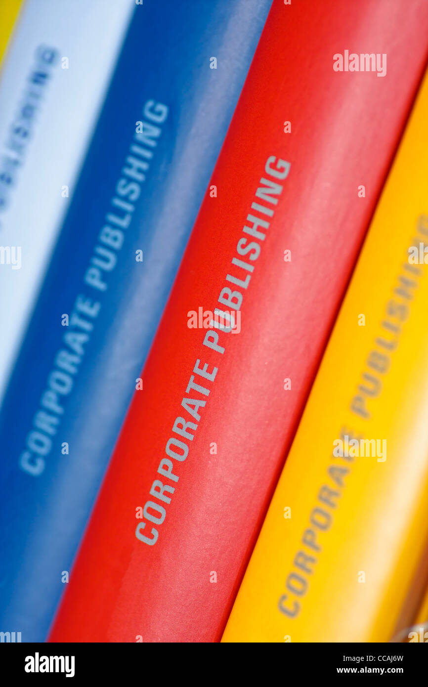 Colorful collection of annual reports in a row Stock Photo