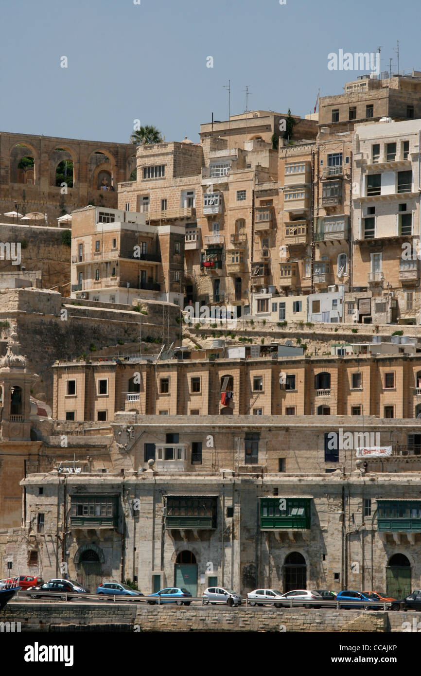 View of the waterfront buildings on the Grand Harbour by the cruise ship dock area. Stock Photo