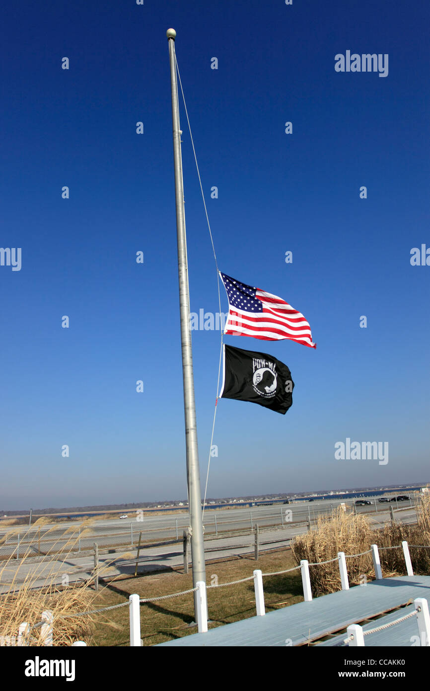 Flags at half mast Smith Point Park Long Island NY Stock Photo