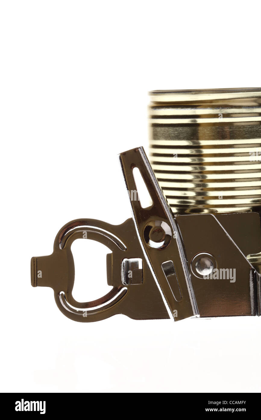 Tin opener opening a can of food isolated on white Stock Photo Alamy