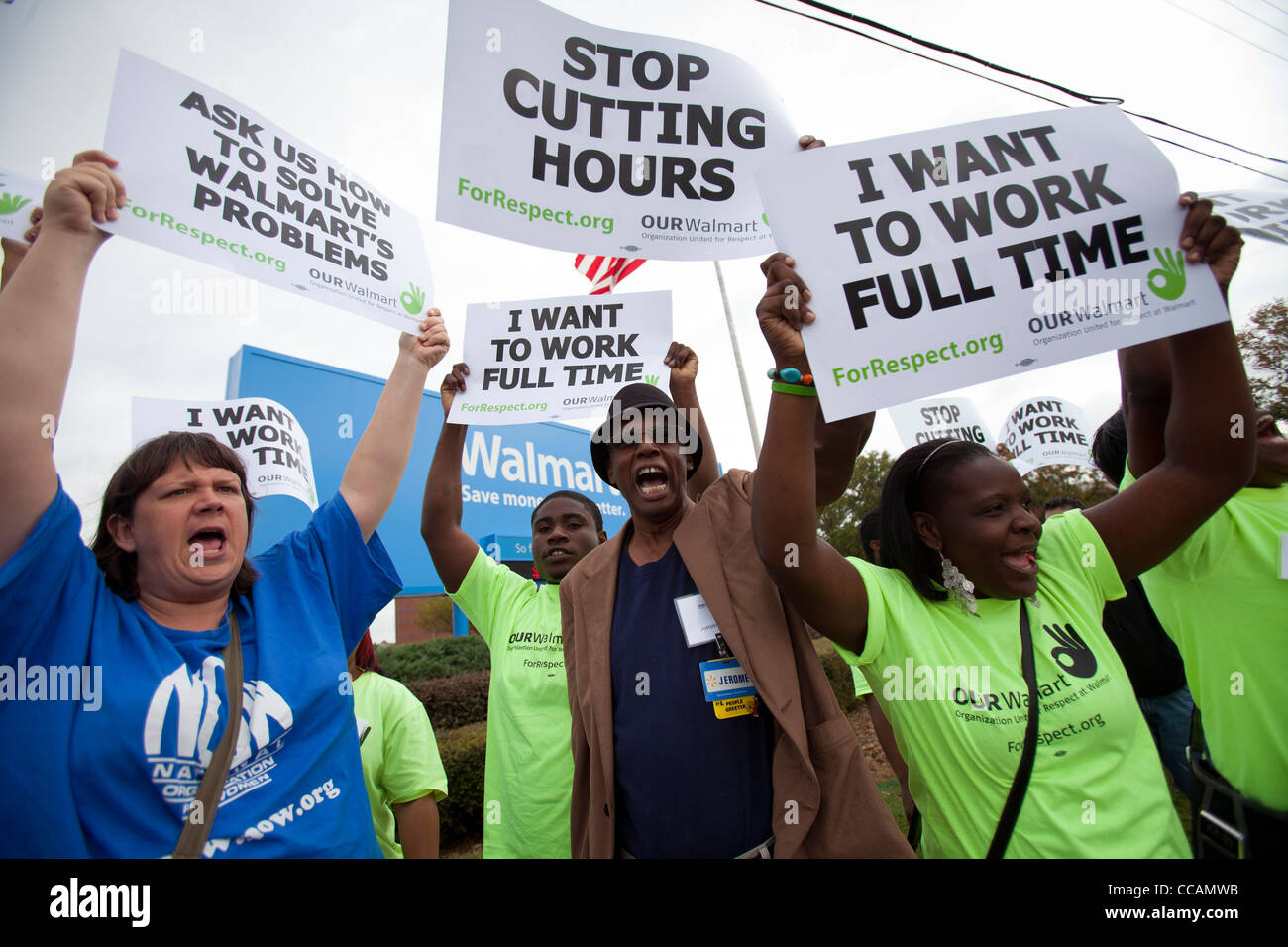 Walmart employees demonstrate in front of the Walmart Home Office in