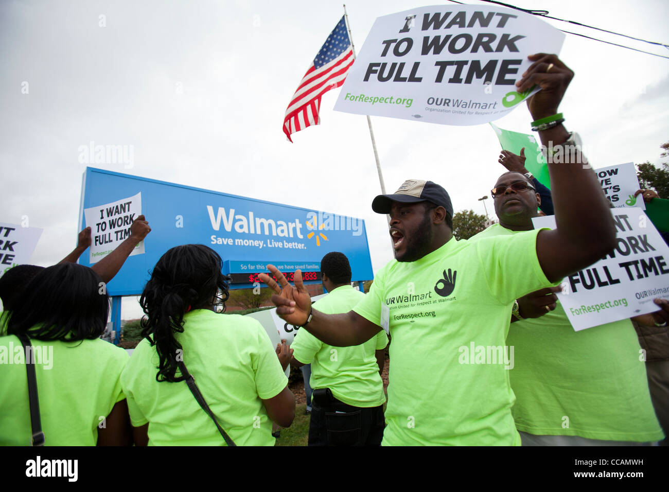 Walmart employees demonstrate in front of the Walmart Home Office in