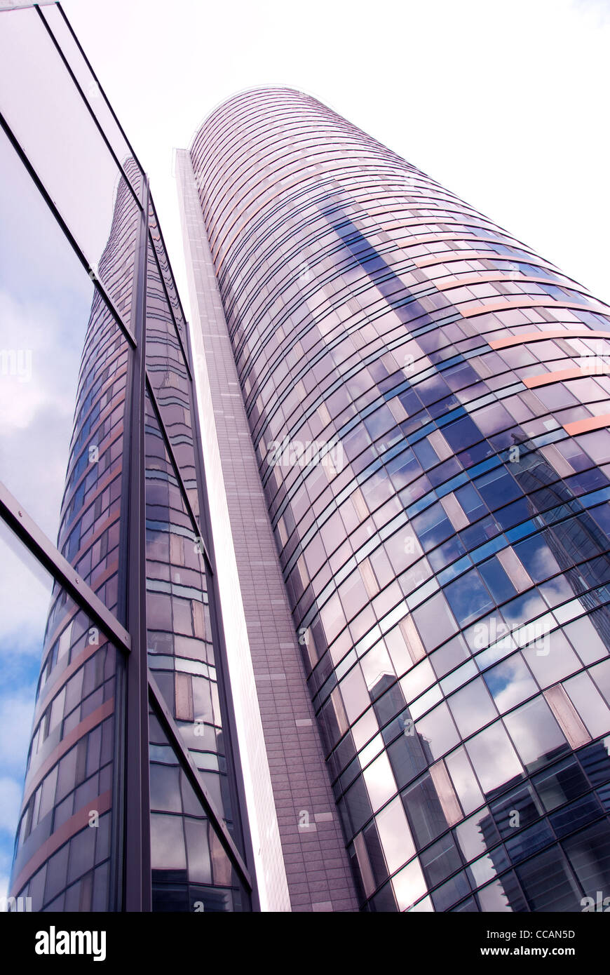 Glass high skyscraper. Modern city architecture background. Stock Photo