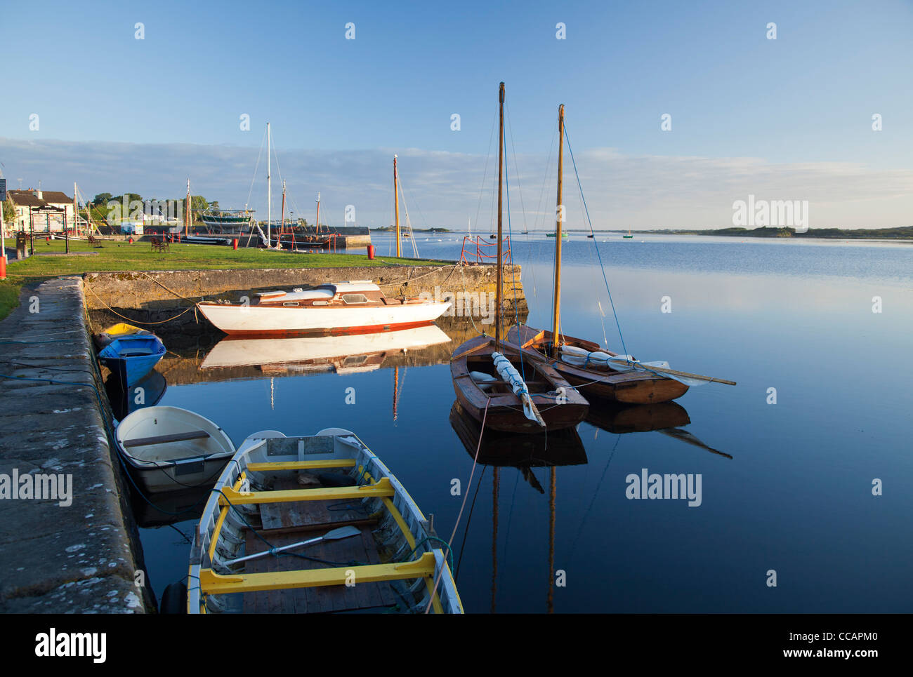 Morning reflections of Kinvara harbour, County Galway, Ireland Stock