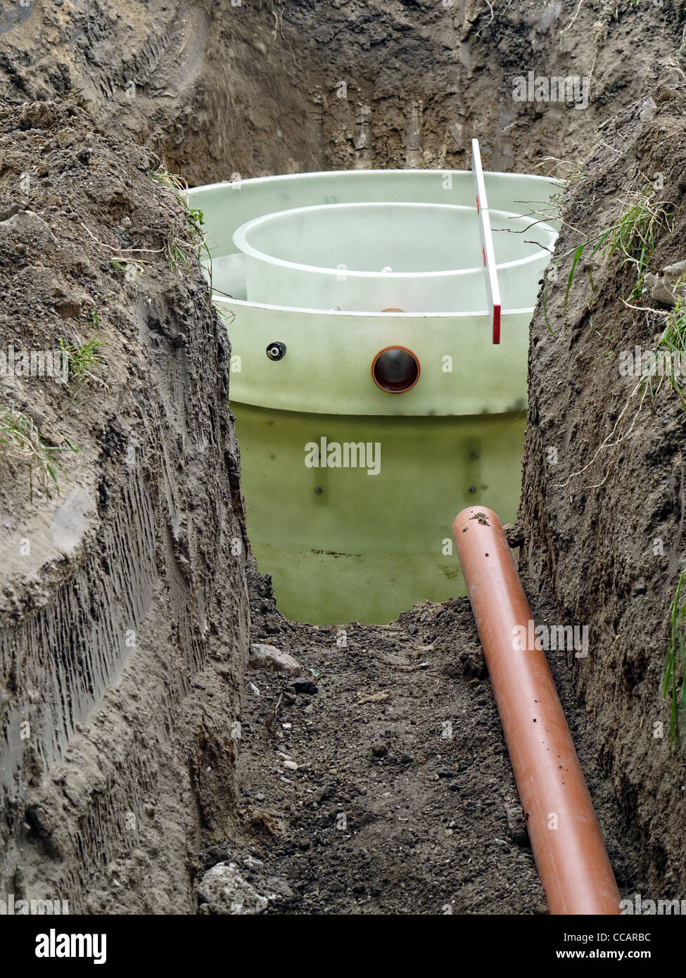 Biological treatment plant of domestic wastewater being set in the ground Stock Photo
