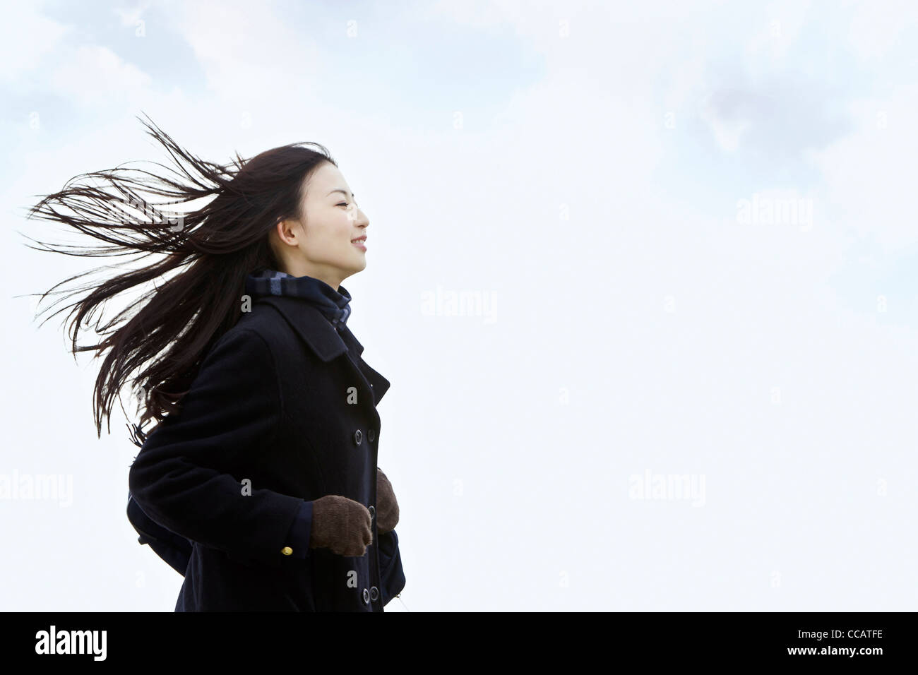 High school girl in the wind Stock Photo