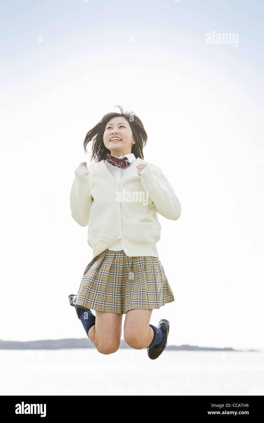 School uniform girl full length hi-res stock photography and images - Alamy