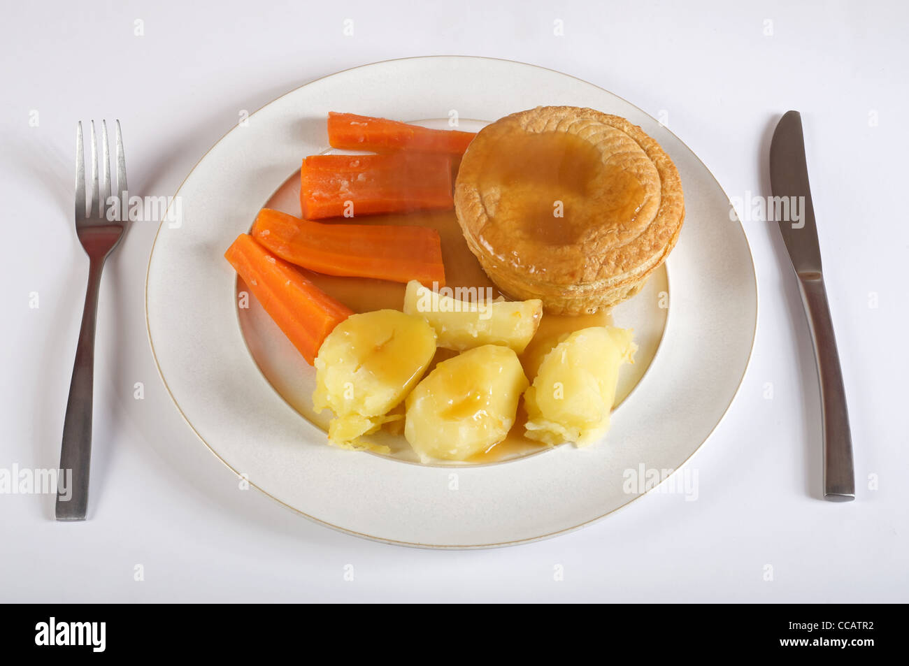 Meat pie gravy potatoes and carrots Stock Photo Alamy