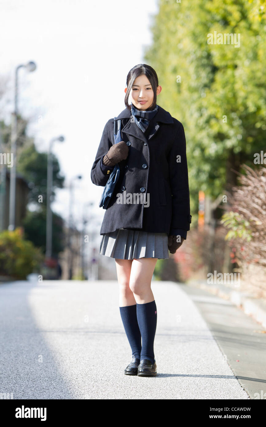 Female High School Student Walking Stock Photo