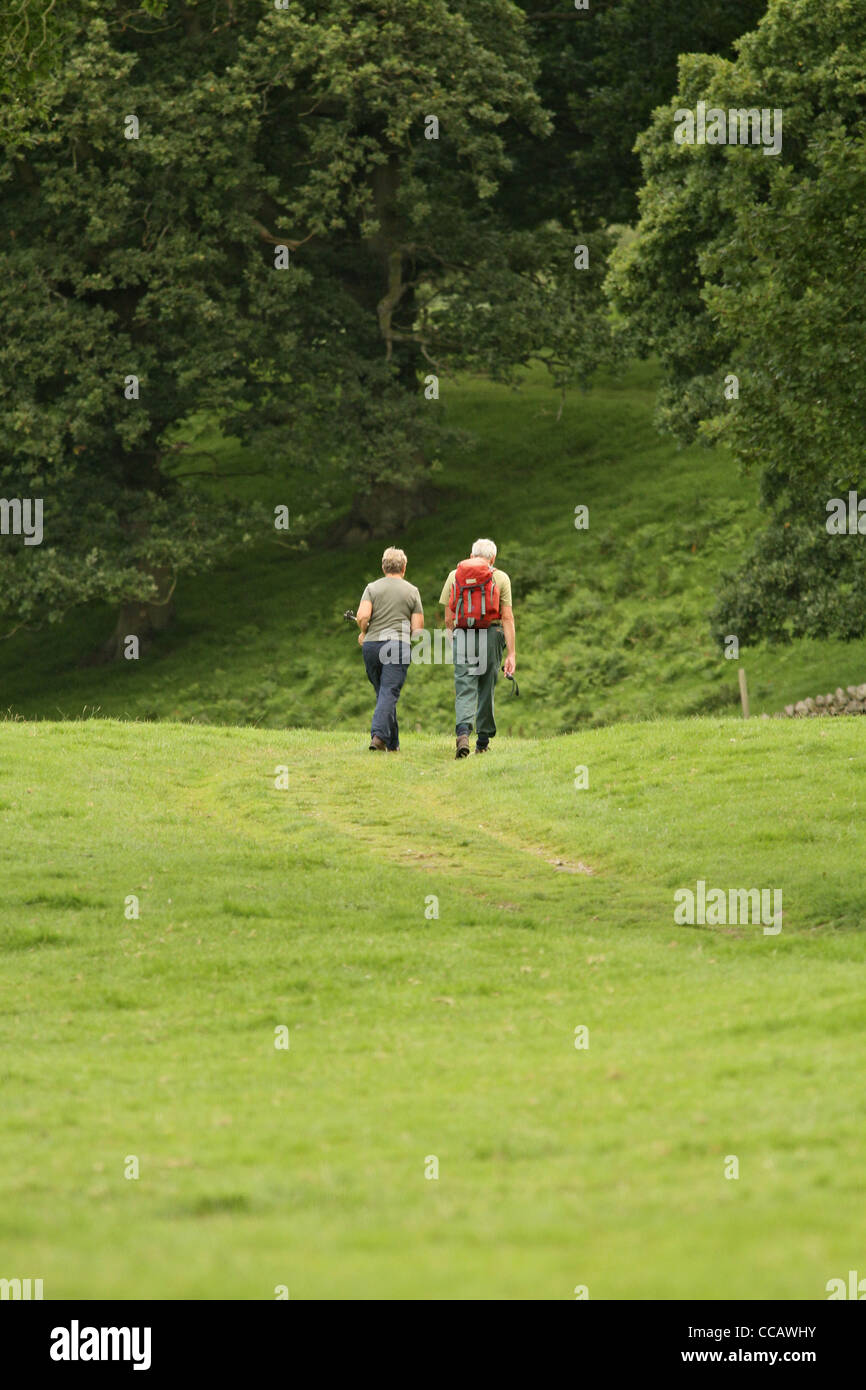 An anonymous middle aged couple walking in the Yorkshire Dales Stock Photo