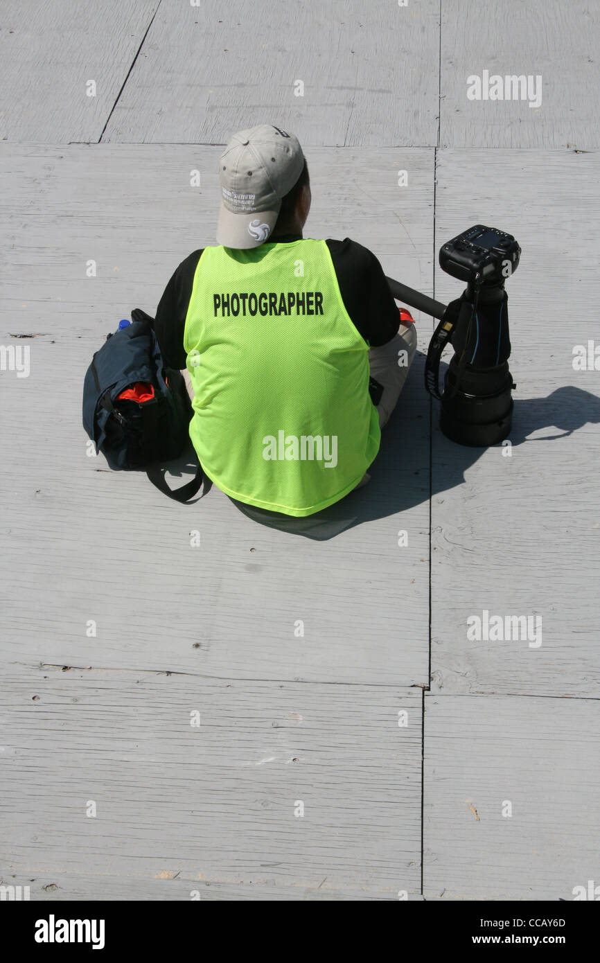 photographer with long lens camera Stock Photo