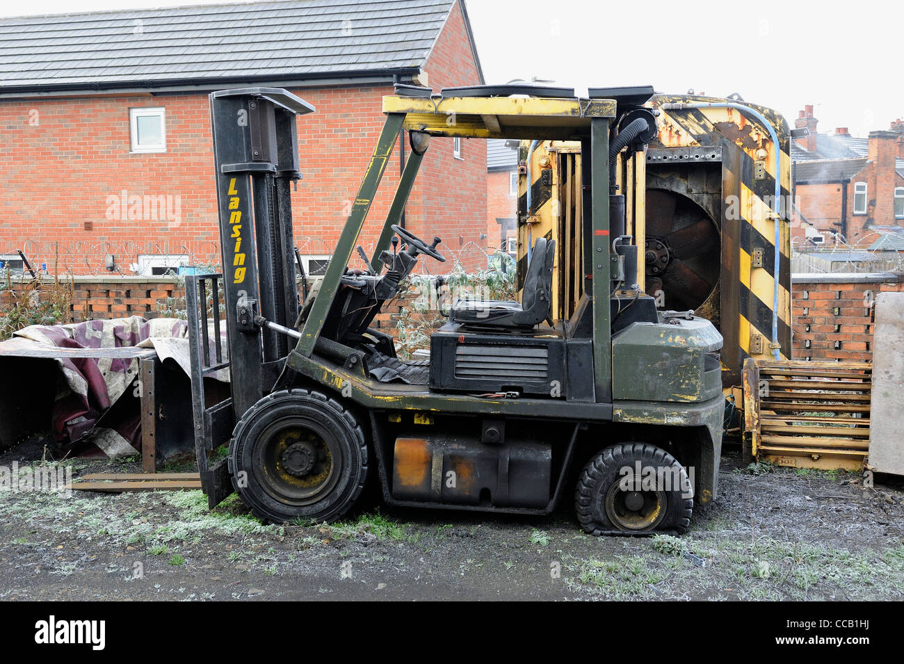 lansing bagnall fork lift truck with flat tyre england uk Stock Photo