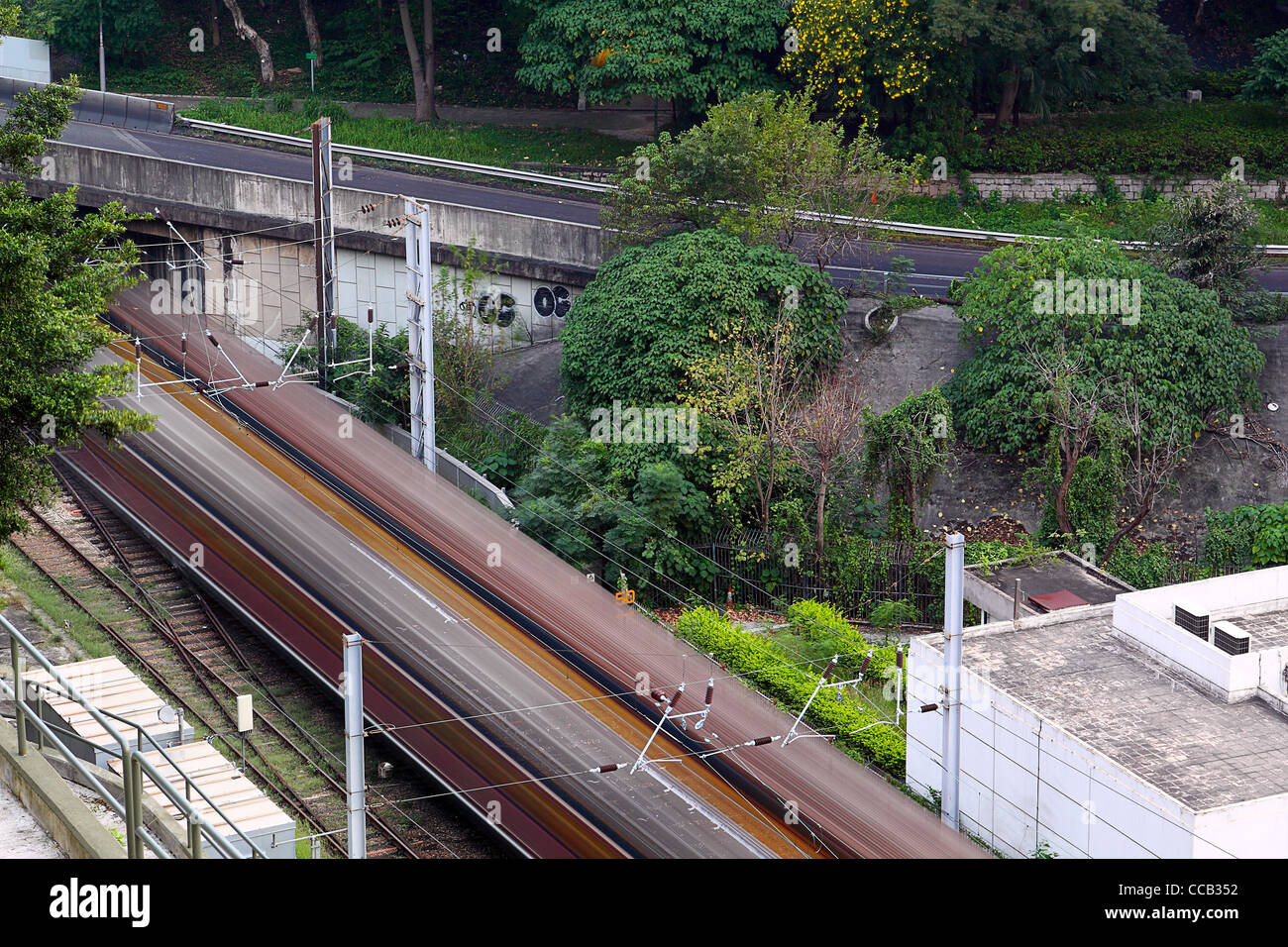 Train rail in city Stock Photo - Alamy