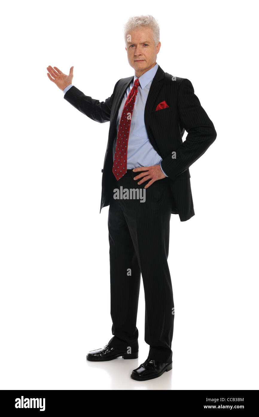 Businessman standing pointing with his right hand isolated on a white background Stock Photo