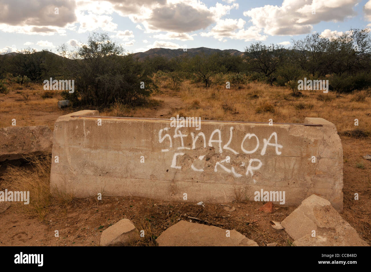 References to smuggling and the Sinaloa cartel are found along a well