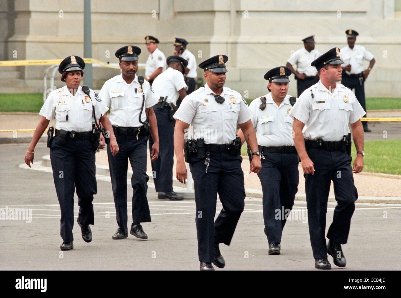 US Capitol Police walk past the US Capitol after a shooting erupted on