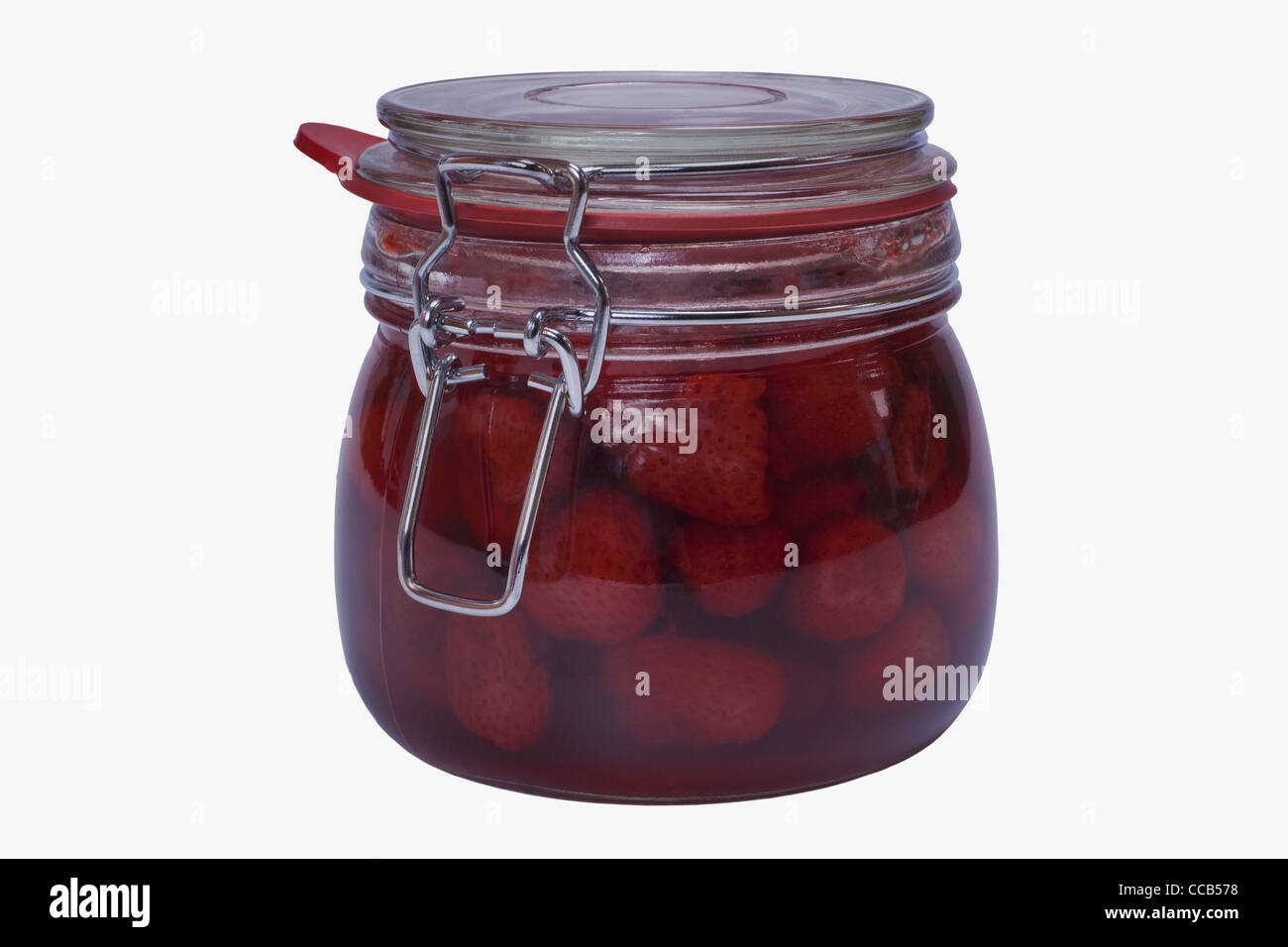 Ein Glas mit eingeweckten Erdbeeren | a jar with home canned strawberries Stock Photo