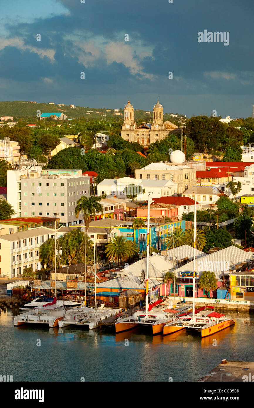 Storm clouds over the Cathedral and harbor town of St. Johns, Antigua, West Indies Stock Photo