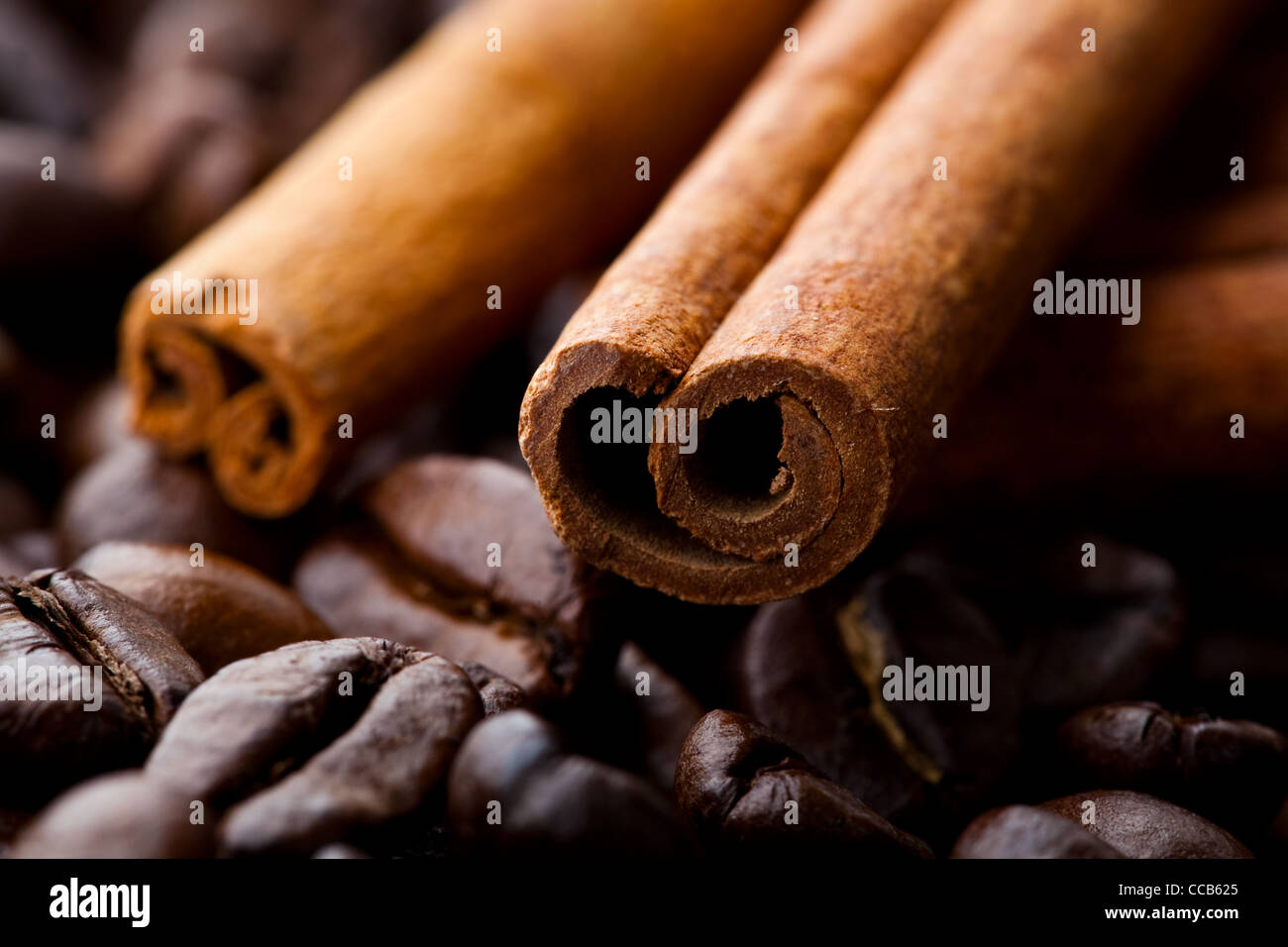 Closeup of cinnamon sticks and roasted coffee beans Stock Photo Alamy