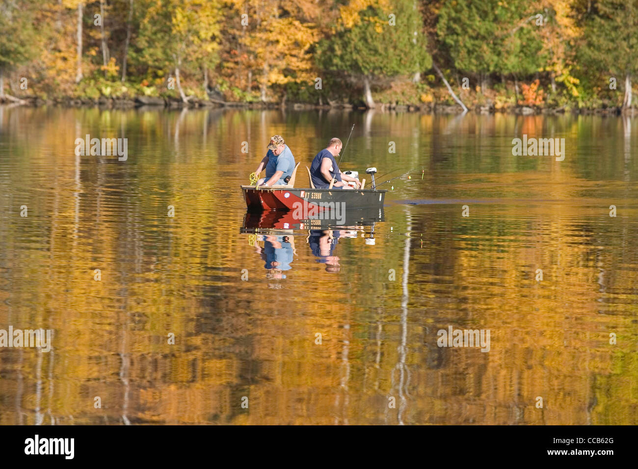 Craftsbury Vermont VT colorful fall foliage reflected in Lake Eligo