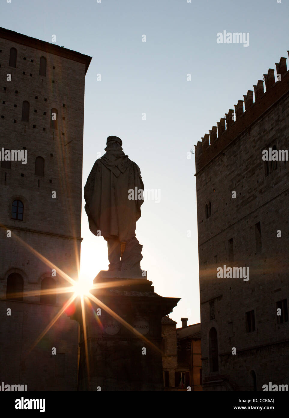 The statue to Giuseppe Garibaldi silhouetted by the sun. Todi, Umbria, Italy. Stock Photo